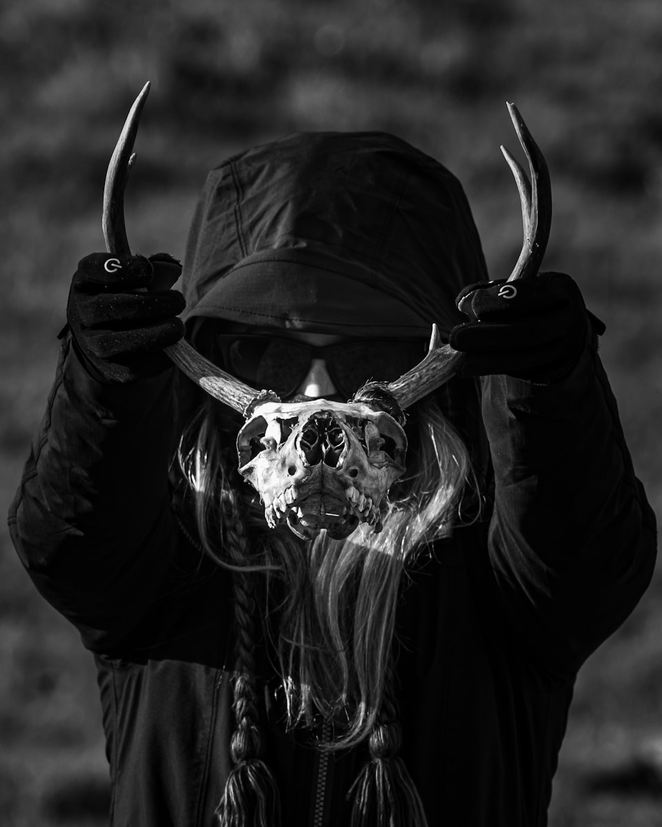 a person with horns and a hat on