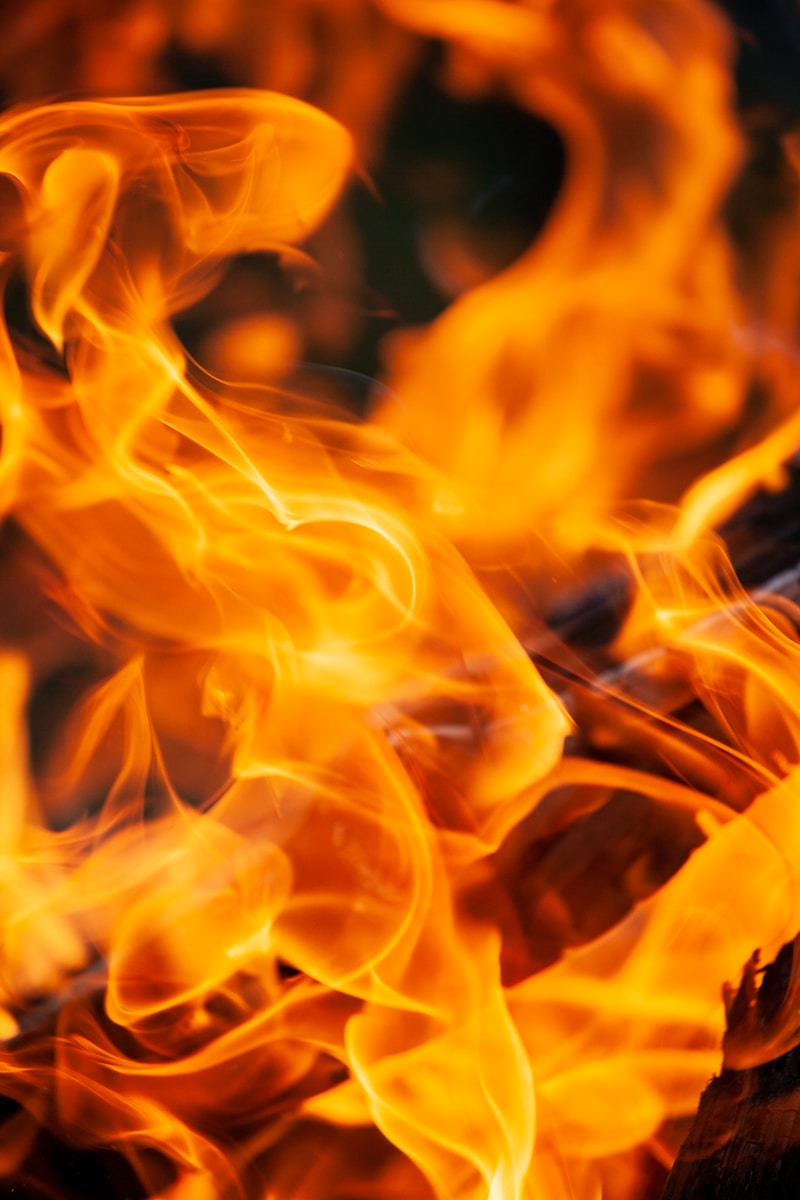 Photo by Maxim Tajer burning wood