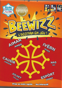 a group of people standing on top of a beach under a cloudy blue sky